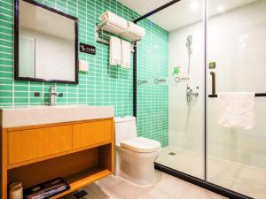 Vannituba majutusasutuses Yimimi Apartment - Guangzhou 13th Line Yide Road Metro Station