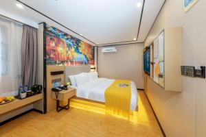 Voodi või voodid majutusasutuse Yimimi Apartment - Guangzhou 13th Line Yide Road Metro Station toas