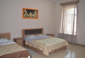 Una cama o camas en una habitación de Ideal