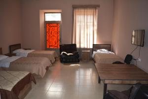 Una cama o camas en una habitación de Ideal