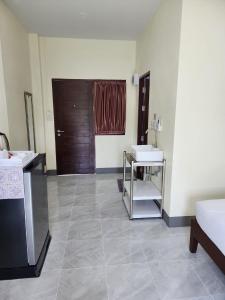 Ένα ή περισσότερα κρεβάτια σε δωμάτιο στο Baan Mae Hostel CNX