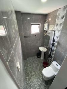 Koupelna v ubytování ANDABAY Tourist Inn