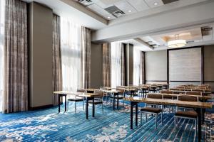 a classroom with tables and chairs in a room at The Westin Memphis Beale Street in Memphis