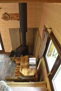an overhead view of a stove in a tiny house at Treehouse Velké Losiny in Velké Losiny
