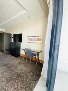 Posezení v ubytování Ocean View Studio Apartment Surfers Paradise - Free Parking