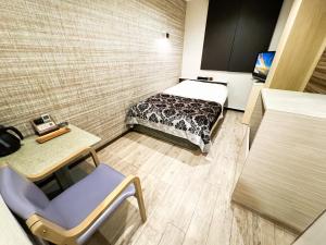 Letto o letti in una camera di Hotel BaliBali Matsudo