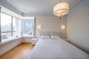 Moli B&B - The Bund Riverview Nanjing East Road 3-Bedrooms with Elevator Apartment Near the subway客房内的一张或多张床位