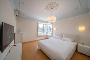 Moli B&B - The Bund Riverview Nanjing East Road 3-Bedrooms with Elevator Apartment Near the subway客房内的一张或多张床位