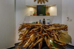 a bathroom with a table made out of wood at Love Room Evasion Duo in Marseille