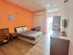 Postel nebo postele na pokoji v ubytování Heng Ann Guest House + 37 fotografií