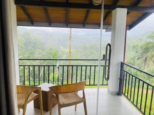 Balkón nebo terasa v ubytování Rainforest Mount Lodge