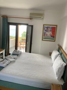 Postel nebo postele na pokoji v ubytování Marianna Sea View Afitos