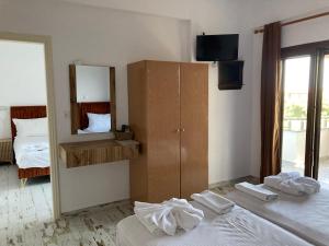 Postel nebo postele na pokoji v ubytování Marianna Sea View Afitos