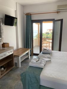 Postel nebo postele na pokoji v ubytování Marianna Sea View Afitos