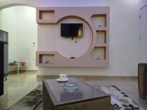 TV a/nebo společenská místnost v ubytování Luxor Star Apartments
