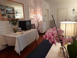 Televisyen dan/atau pusat hiburan di Luxury House B&B