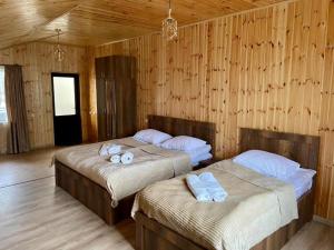 Llit o llits en una habitació de JamarJeti