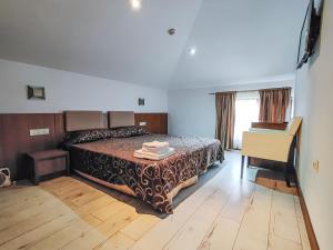 Postel nebo postele na pokoji v ubytování Family Hotel Casa del Mare