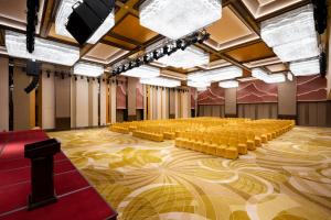 an empty room with chairs on the floor at Latsavong Wanda Vista Vientiane in Vientiane +96 photos