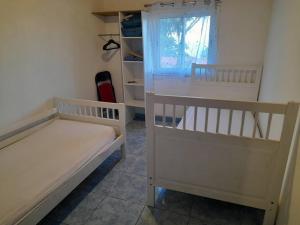 Postel nebo postele na pokoji v ubytování Ti Caze Mémé