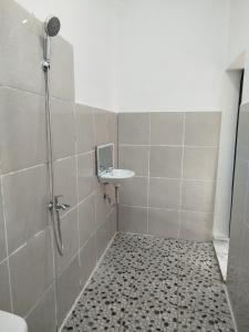 Koupelna v ubytování Marsha Homestay