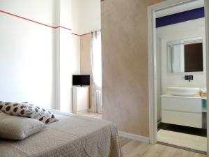 Postel nebo postele na pokoji v ubytování B&B Melanella