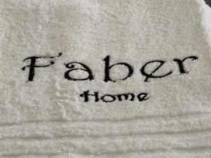 Certifikát, hodnocení, plakát nebo jiný dokument vystavený v ubytování Faber Home