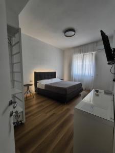Postel nebo postele na pokoji v ubytování Faber Home