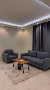 Istumisnurk majutusasutuses شقق هوليداي بلس مشرفه - Holiday Plus Mishrifah Apartments
