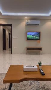 Televiisor ja/või meelelahutuskeskus majutusasutuses شقق هوليداي بلس مشرفه - Holiday Plus Mishrifah Apartments