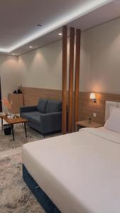 Voodi või voodid majutusasutuse شقق هوليداي بلس مشرفه - Holiday Plus Mishrifah Apartments toas