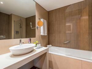 Ein Badezimmer in der Unterkunft Mercure Lisboa Almada