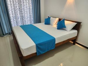Giường trong phòng chung tại Onel Rest Inn