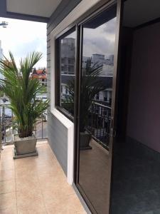 Balkón nebo terasa v ubytování Baan Ketkeaw Guest House 2
