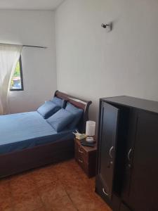Postel nebo postele na pokoji v ubytování PAPAYAS SELF catering ROOM