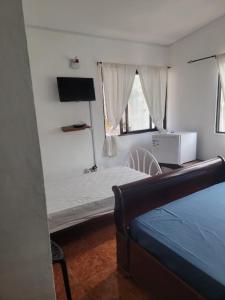 Postel nebo postele na pokoji v ubytování PAPAYAS SELF catering ROOM