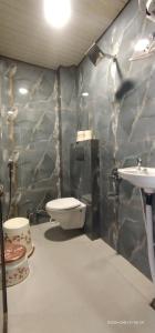 Koupelna v ubytování Hotel nandmani