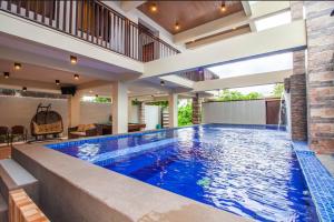 Πισίνα στο ή κοντά στο Casa Florida Private Resort - Calamba