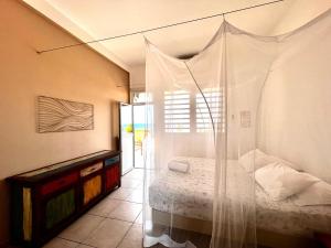 Postel nebo postele na pokoji v ubytování Martinique Villa Escale Diamant + 22 fotografií