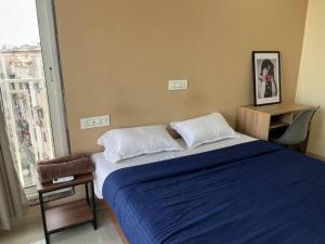 Letto o letti in una camera di 3BHK Apartment Santacruz Mumbai, 104
