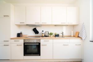 Kuchyň nebo kuchyňský kout v ubytování Idyllische Ferienwohnung am Schaalsee - Natur und Erholung pur