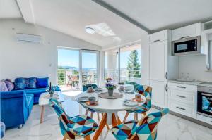 Kuchyň nebo kuchyňský kout v ubytování Villa Hanna Apartments