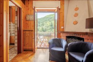 Posedenie v ubytovaní Roccaraso Love & Lodge - Mountain Chalet