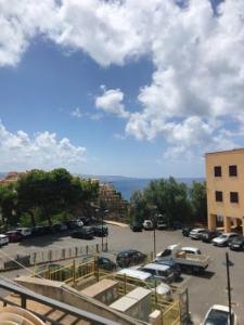 a parking lot with a view of the ocean at Bed & Breakfast Casa Galeano in Pizzo