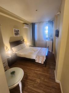 Postel nebo postele na pokoji v ubytování Adrys Boutique Villa