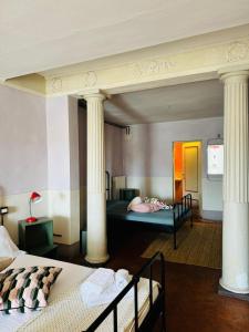 Postel nebo postele na pokoji v ubytování b&b mediceo 16