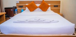 Postel nebo postele na pokoji v ubytování Freedom Resort