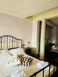 Postel nebo postele na pokoji v ubytování b&b mediceo 16