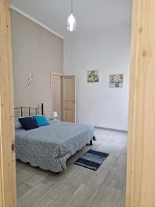 Ένα ή περισσότερα κρεβάτια σε δωμάτιο στο 'O Vascio Vomero