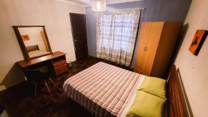 Postel nebo postele na pokoji v ubytování Casa de Viajeros + 2 fotografie